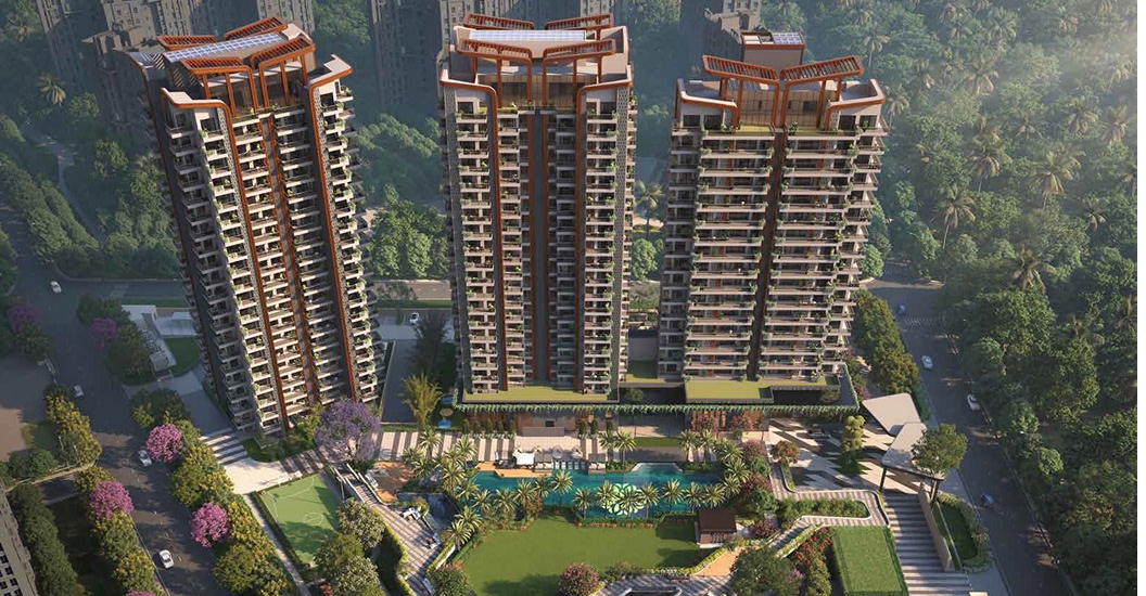 Aerial daytime view of towers and podium